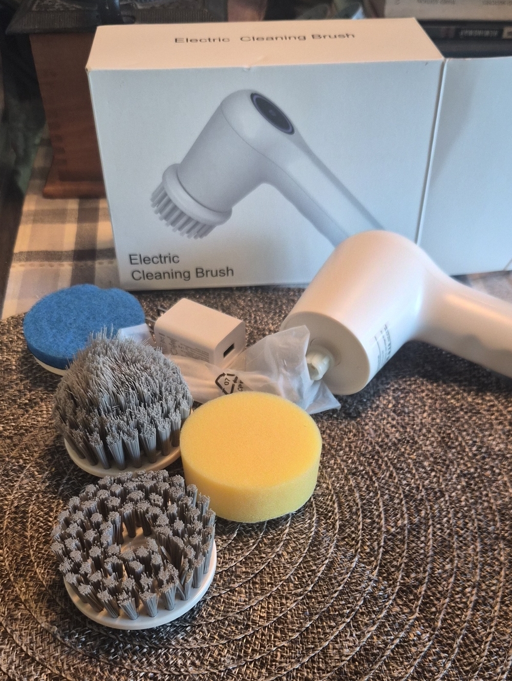 Electric Cleaning Brush with Interchangeable Gray, Blue, and Yellow Heads